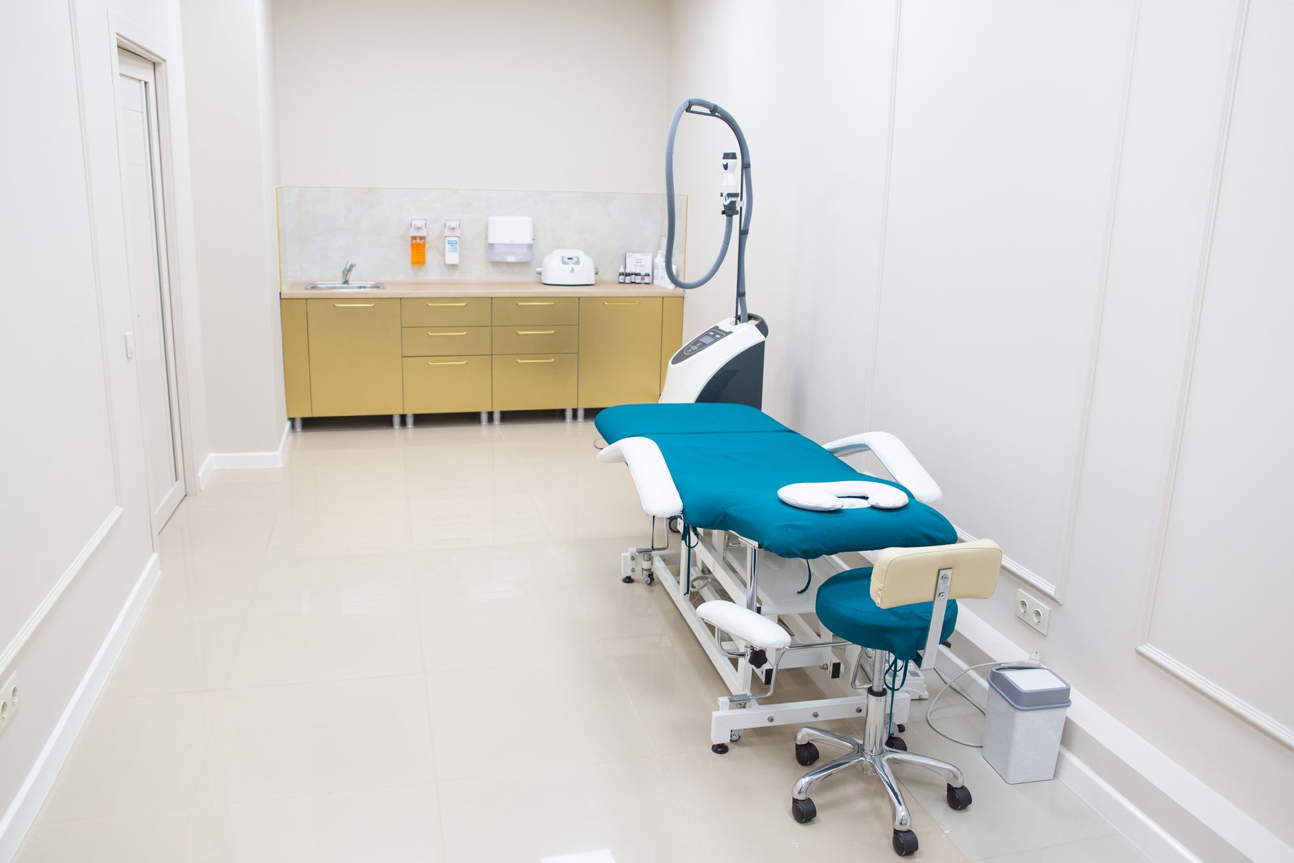 A treatment room with a medical chair